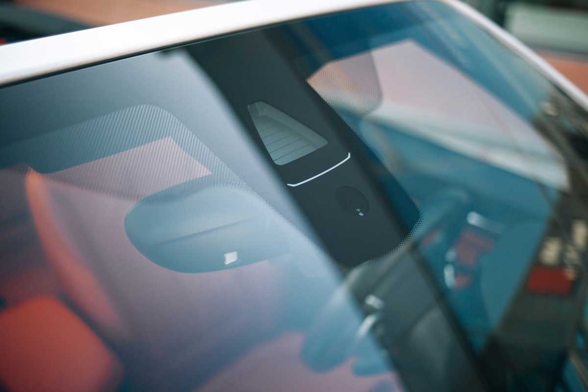 up-close view of a windshield that has advanced drivers assistance system